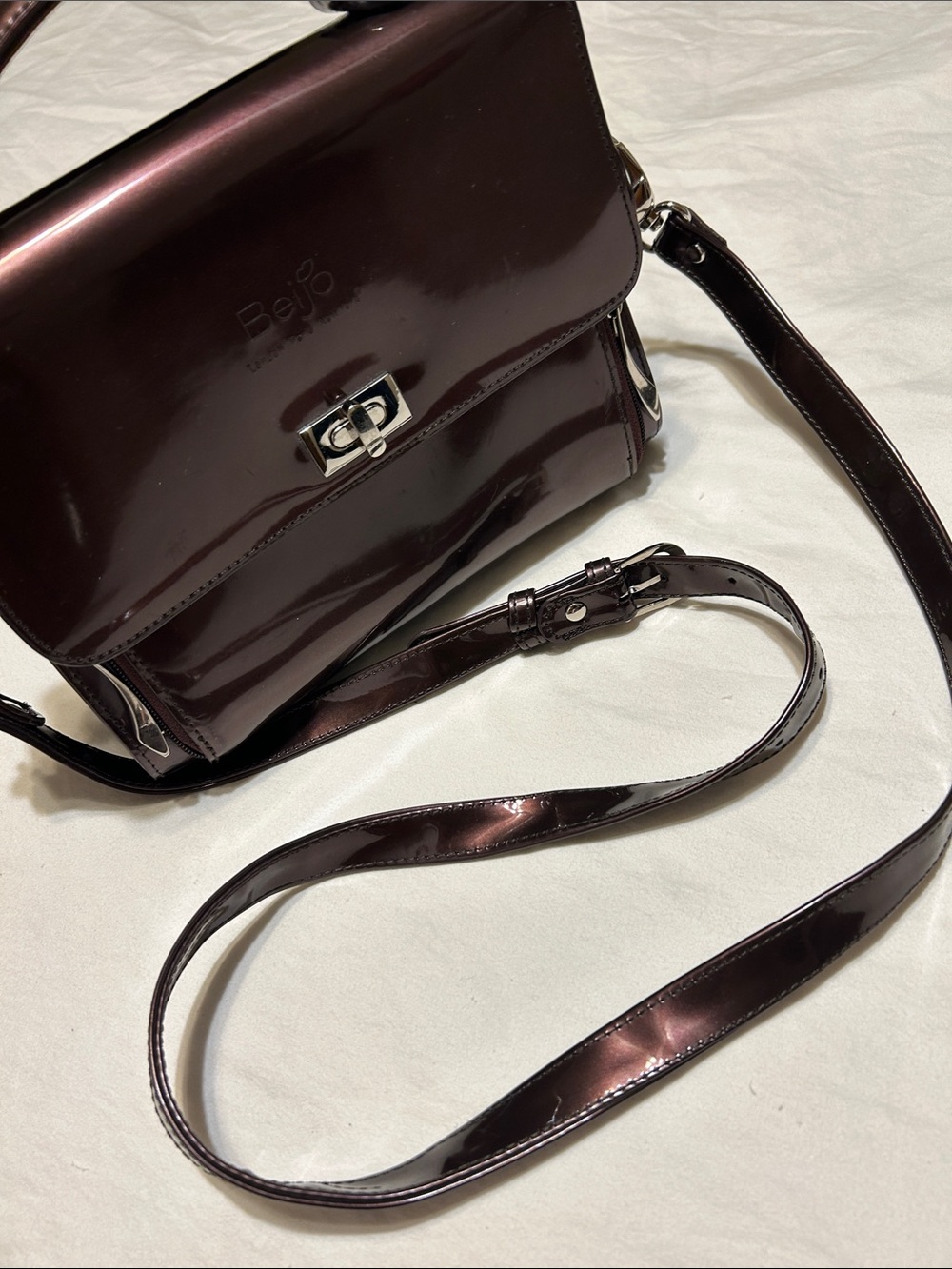 Beijo Patent Crossbody Bag in Deep Plum